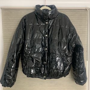 Vinyl look shiny black puffer jacket.